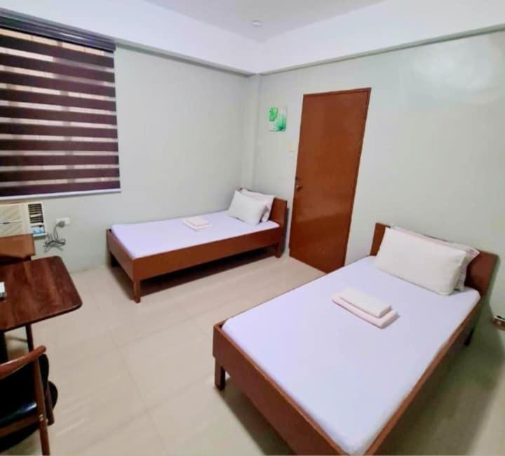 Brielles Travellers Inn Ταγκμπιλαράν Εξωτερικό φωτογραφία